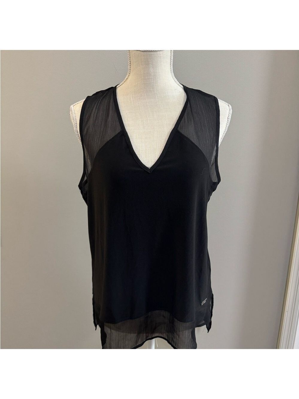 DKNY Black Sheer V- neck Sleeveless Blouse. Size medium